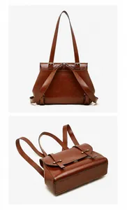 Detail view of brown wax leather backpack showing adjustable straps and bottom profile