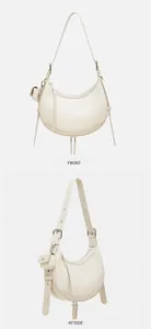 Front and side view of beige crocodile embossed leather hobo bag with a mini pouch