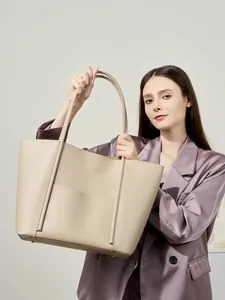 Minimalist beige leather tote bag with large capacity for women's daily commute style