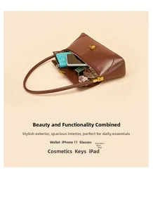 Internal storage detail of brown leather baguette bag with wallet, phone and cosmetics