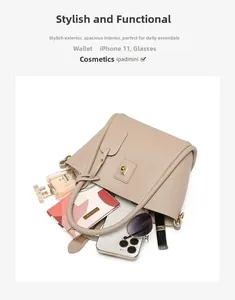 Top view of beige leather bucket bag showing large capacity for phone, wallet and cosmetics