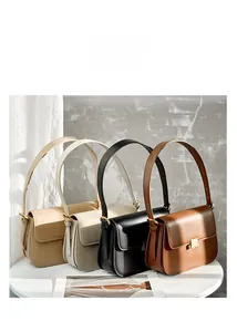 Four elegant leather shoulder bags in beige, white, black and brown with gold buckles