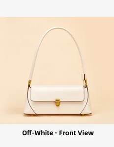 Front view of an off-white baguette bag featuring a gold metal lock and brown edges