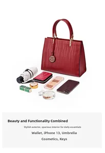 Red leather tote bag interior view showing large capacity for umbrella, wallet and makeup
