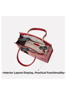 Detailed interior view of a red crocodile pattern leather handbag showing multiple pockets