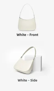 Detail view of white leather baguette bag showing front and side profile with gold logo