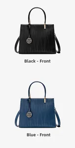 Front view of black and blue leather handbags with wave texture and gold logo charms