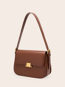 Brown leather crossbody bag with adjustable strap and square gold metal buckle clasp
