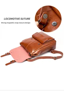 Detail view of large capacity leather backpack with magnetic buckle and vintage stitching