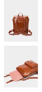 Detail view of large leather backpack with magnetic snap closure and back zipper pocket