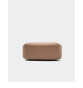 Detailed view of genuine leather bag bottom with premium lychee grain and precise stitching