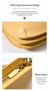 Detail of genuine leather bag showing multi-layer accordion structure and metal zipper