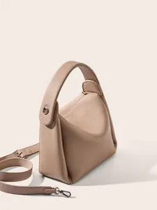 Litchi pattern leather shoulder bag in beige with top handle and adjustable strap