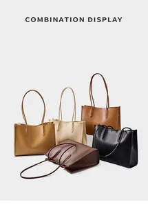 Vista detallada del grupo de bolsos tote grandes de cuero en cinco colores clásicos