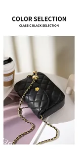 Macro detail of quilted leather texture and golden camellia flower buckle on shoulder bag
