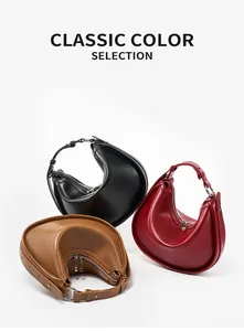 Three half-moon shoulder bags in black, red, and brown smooth leather with silver zippers