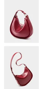 Detailed views of the deep red crescent hobo bag made of smooth premium leather finish