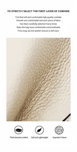 Gros plan sur le grain de cuir de vachette crème de haute qualité pour ce sac cabas