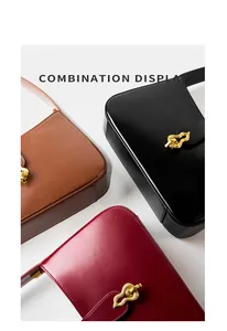 Sacs portés épaule en cuir marron, noir et bordeaux avec boucles dorées ondulées