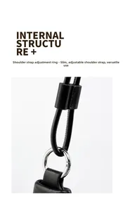 Detail of black leather strap with silver metal ring on high-quality croissant bag
