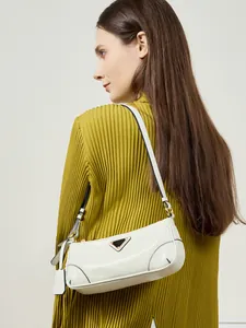 White oil wax leather shoulder bag for women with polished finish and metal triangle logo