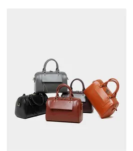 Detailed view of the Boston handbags collection in multiple colors and genuine leather texture
