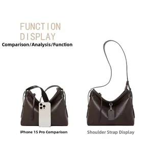 Deep brown pebble grain leather tote bag size comparison with an iPhone 15 Pro