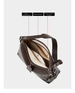 Close-up of the leather shoulder bag interior showing main compartment and pockets