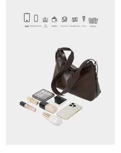 Large vintage brown leather tote bag interior view showing storage for iPad and wallet