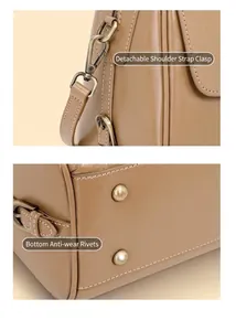 Detailansicht der braunen Ledertasche mit abnehmbarem Gurt und Bodennägeln zum Schutz