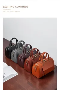 Group of leather Boston handbags in black, grey, burgundy, brown, and orange colors