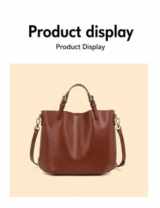 Dettaglio della borsa tote in pelle marrone scuro con finiture in bronzo e tracolla regolabile