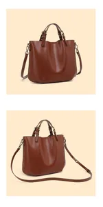 Dettaglio della borsa tote in pelle martellata marrone scuro con texture e cuciture fini