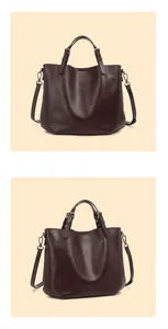 Dettaglio della borsa tote in pelle bordeaux scuro con manici regolabili e fibbie in bronzo