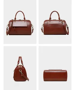 Detailed four-way view of a red-brown leather Boston bag with vintage metal buckles
