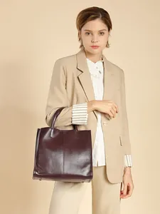 Vertical genuine leather tote bag in burgundy with smooth finish and top handle for women
