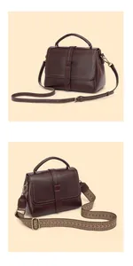 Detail of dark brown pebble leather bag with interchangeable thin leather and wide fabric straps