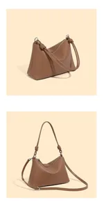 Detailansicht der braunen Leder-Tasche mit Knotengriff und verstellbarem Schultergurt
