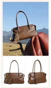 Vista detallada del bolso tote de cuero genuino marrón oscuro con grano fino y pliegues