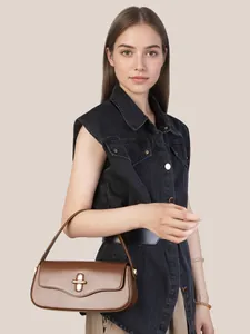 Brown leather baguette shoulder bag with gold cross-lock and smooth matte finish