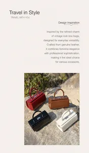 Detail of square cow leather handbag with metal lock and curved handle on stone background