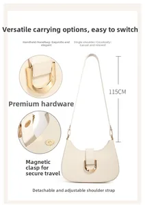 Detail der verstellbaren 115cm Gurt und Magnetverschluss an beiger Leder Baguette-Tasche