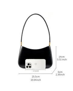 Detailed view of black leather underarm bag with dimensions 25.5cm x 14cm x 6cm