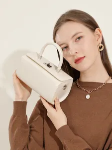Minimalist cream white genuine leather square box bag with silver hardware and top handle