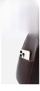 Detail of the hidden side pocket for 6.7 inch smartphones on dark brown leather tote bag