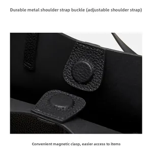 Detail of lychee pattern leather tote with adjustable hardware and magnetic closure