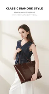 Detailed close-up of dark brown leather tote with glossy finish and vertical stitching