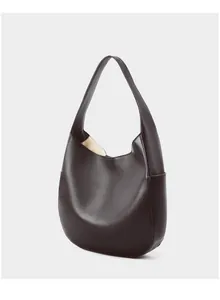 Detail of the high-quality lychee grain leather texture on the dark brown hobo tote bag