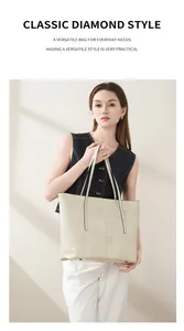 Detail of vintage oil wax leather texture and wear-resistant metal rivets on the tote bag