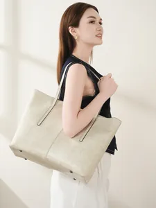 Minimalist beige leather tote bag with vintage texture and large capacity for women